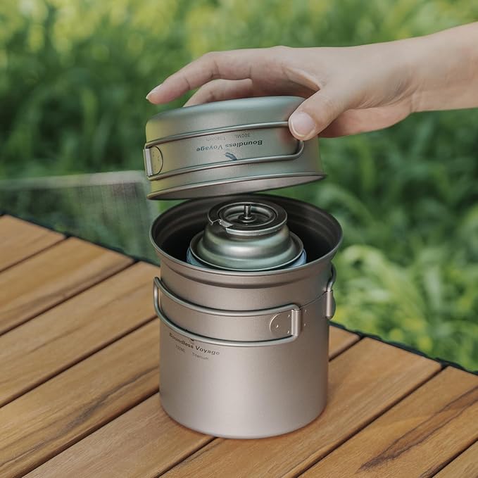 iBasingo Backpacking Cookset Titanium Camping Pots Set Ultralight Outdoor Picnic Pots Pans with Folding Handle Druable Portable Cooking Mess Kit Compact Picnic Dishes Bowls Cups (Multiple Sizes)