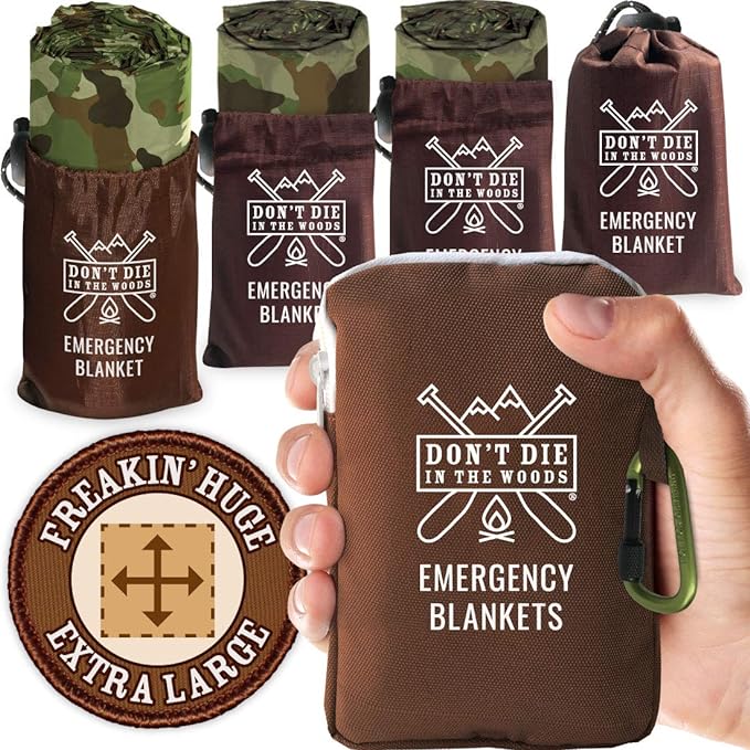 Don't Die In The Woods - Freakin’ Huge Emergency Blankets [4-Pack] Extra-Large Thermal Mylar Space Blankets with Ripstop Nylon Stuff Sacks + Carabiner Zipper Pack [Woodland Camo]